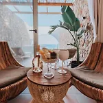 Delfini Beach Hotel & Suites